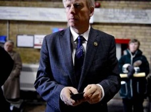 Mayor David Miller sends tweets out to his followers from his BlackBerry.