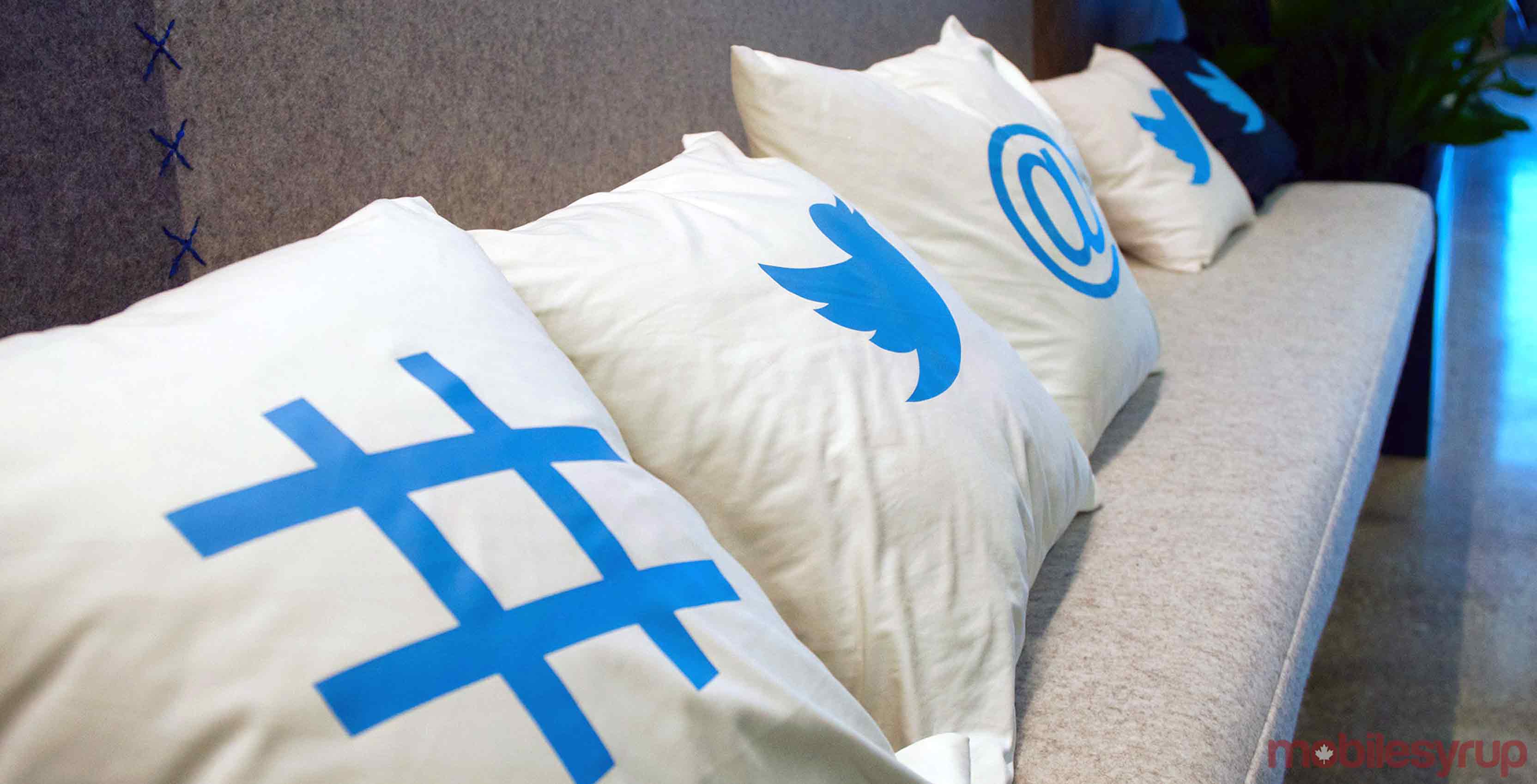Twitter Pillows on couch