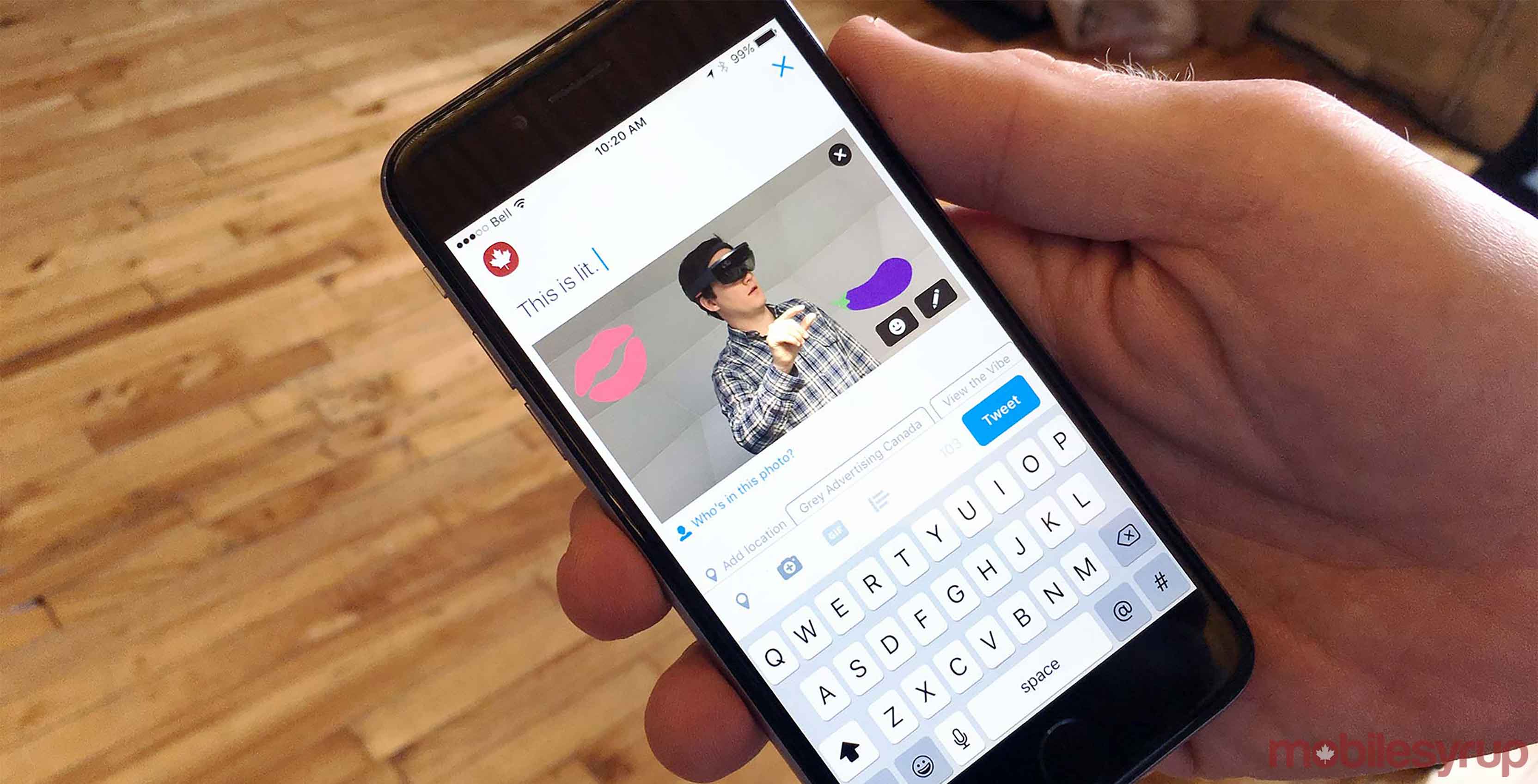 Twitter stickers shown on a phone with custom emoji