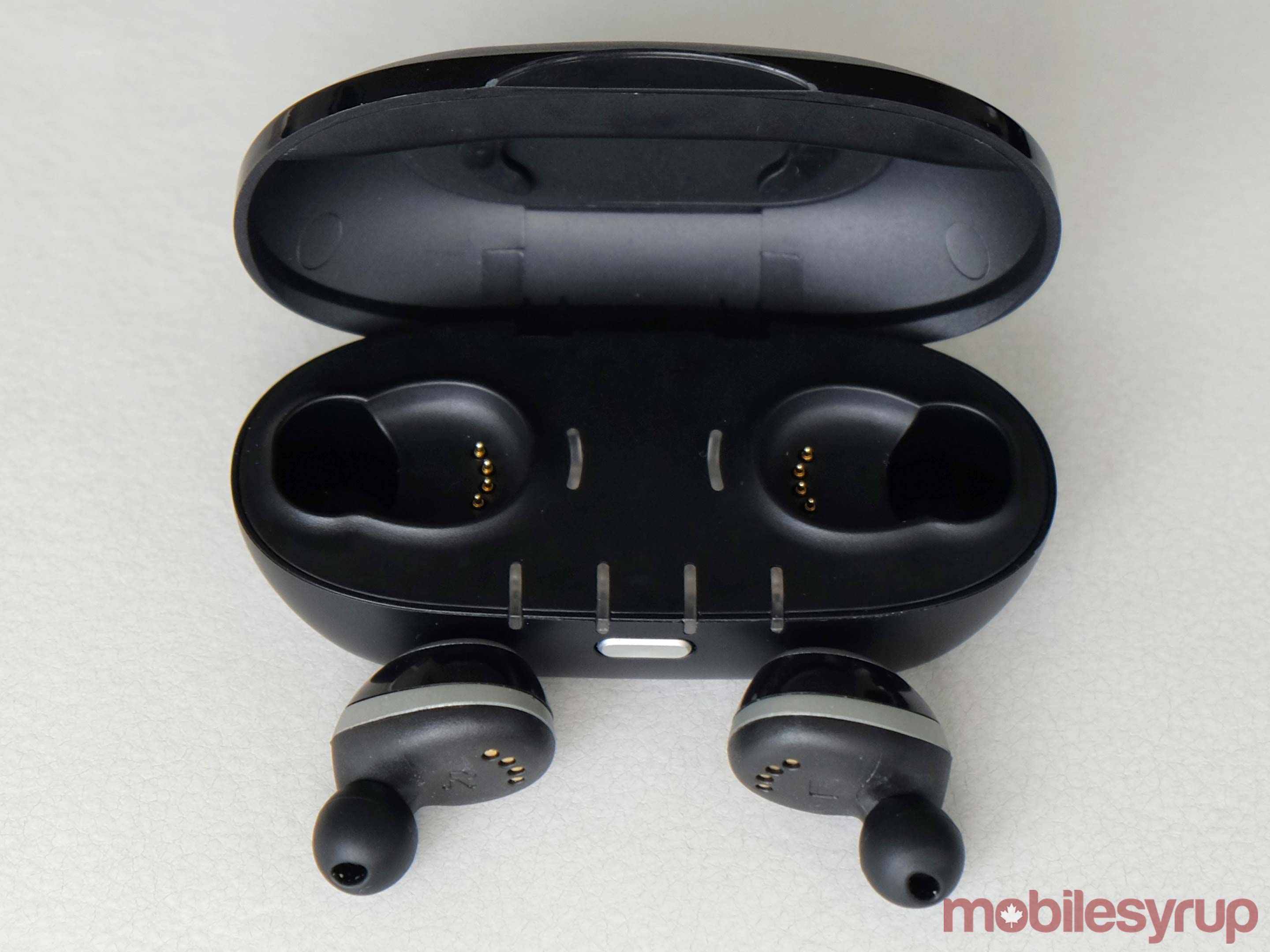 IQBuds beside case