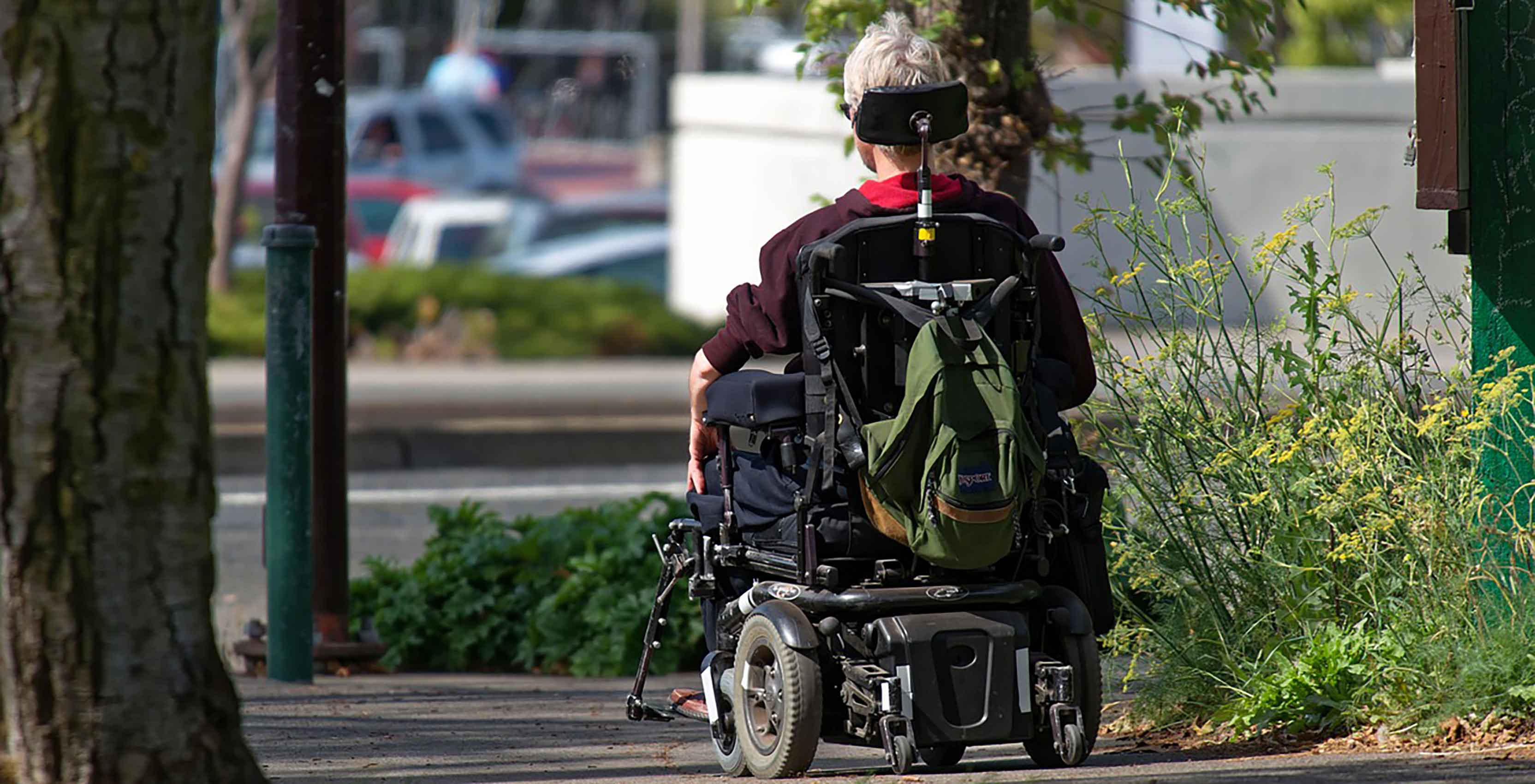 Man in motorized wheelchair