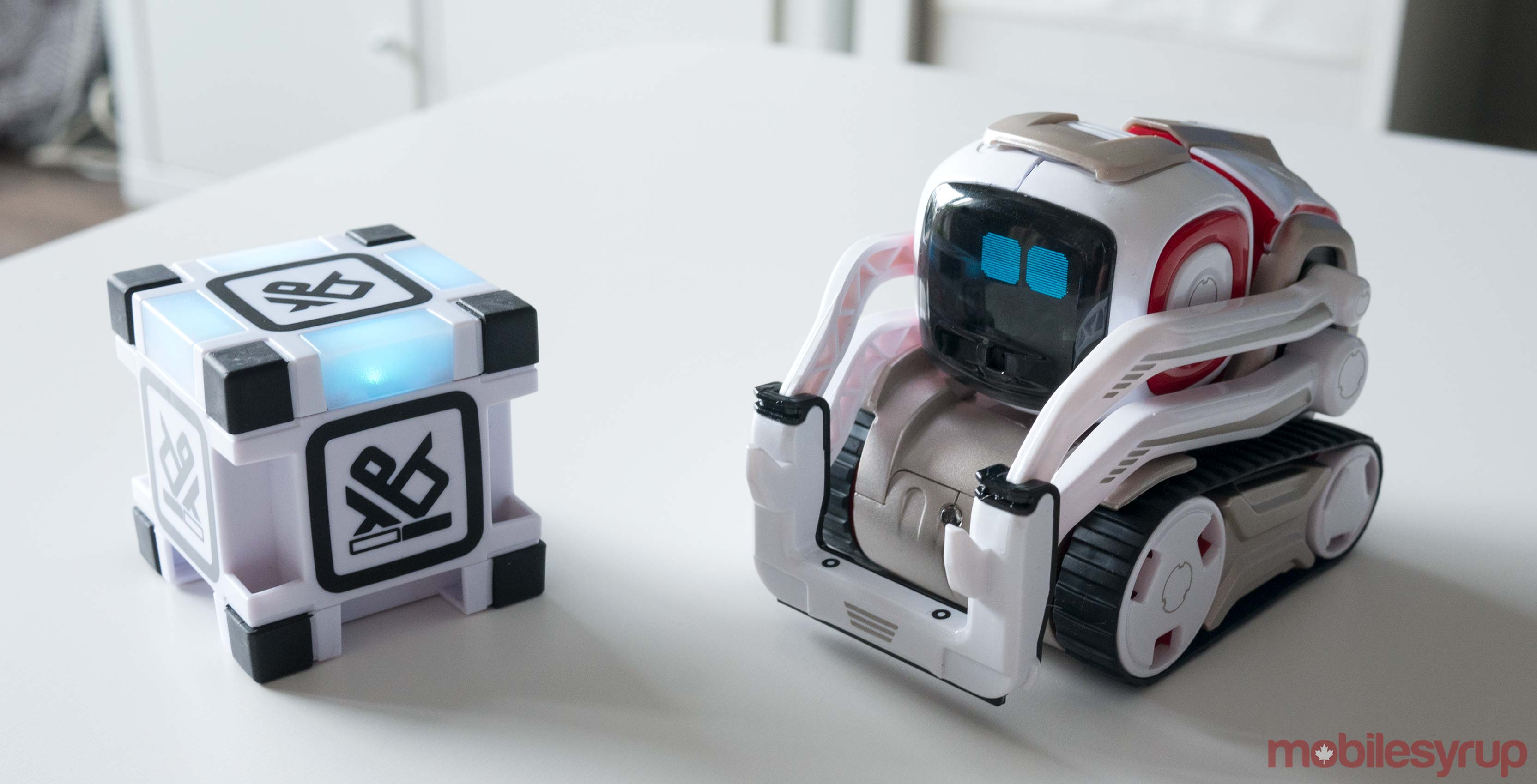 anki cozmo robot with power cubes