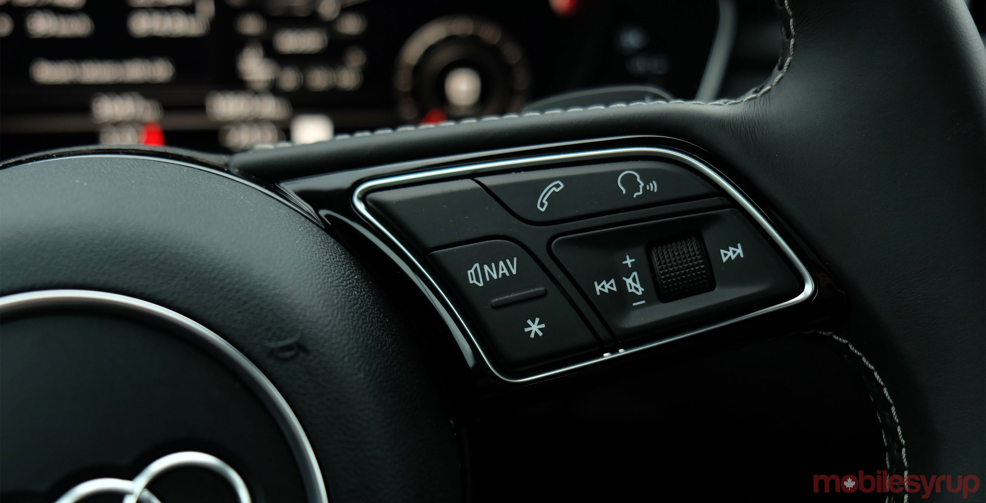Audi MMI steering wheel header