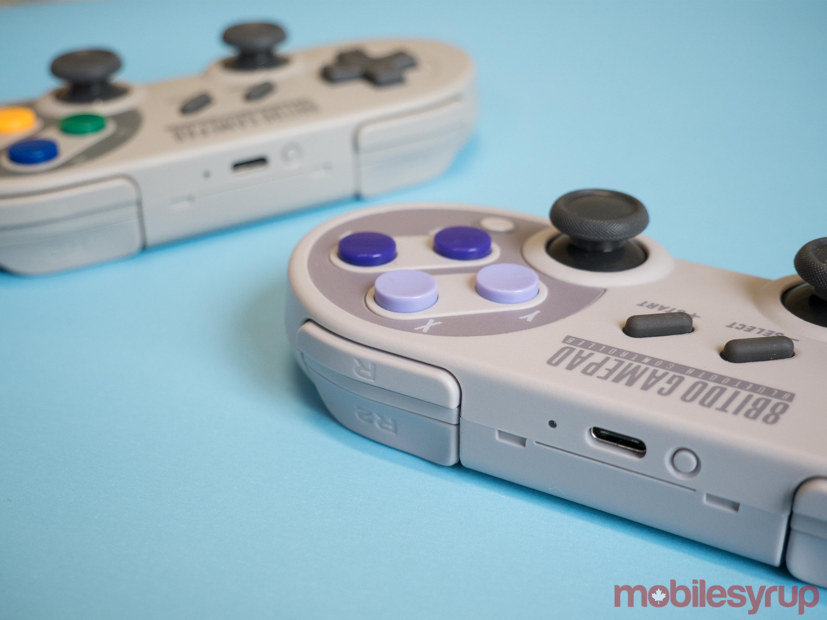 8bitdo's SN30 and SF30 Pro controller from a side view