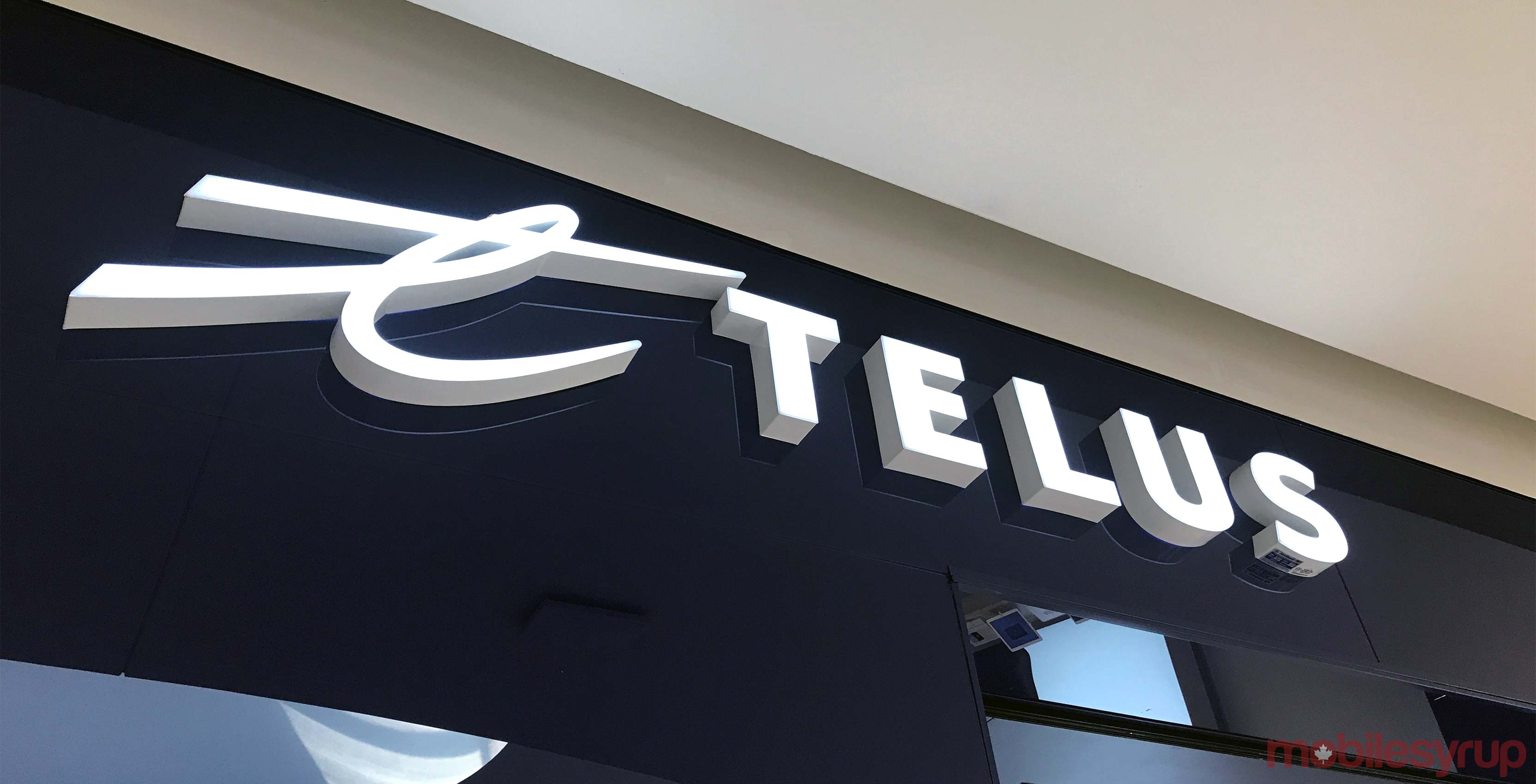 Telus logo on wall