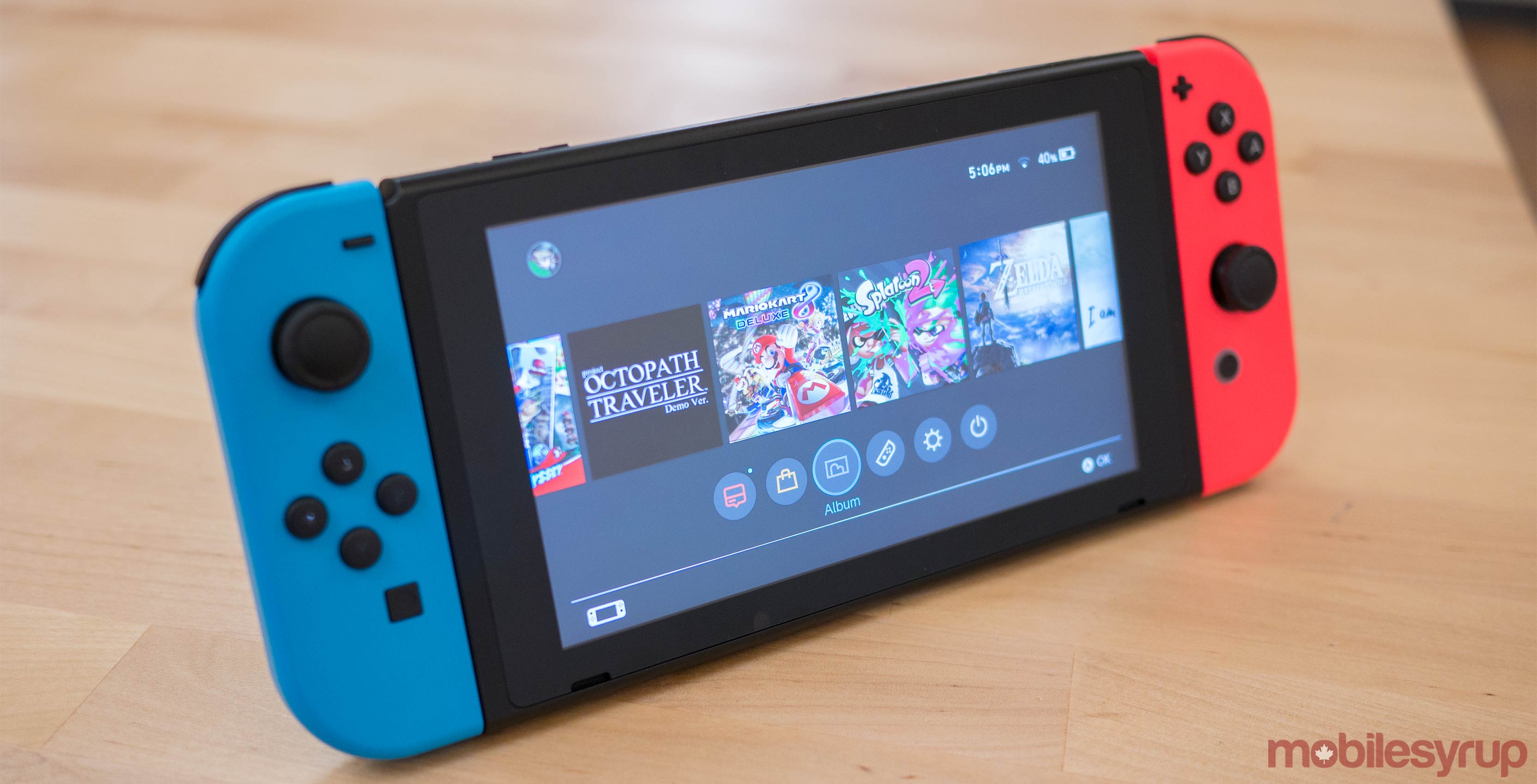 Nintendo Switch red and blue on table
