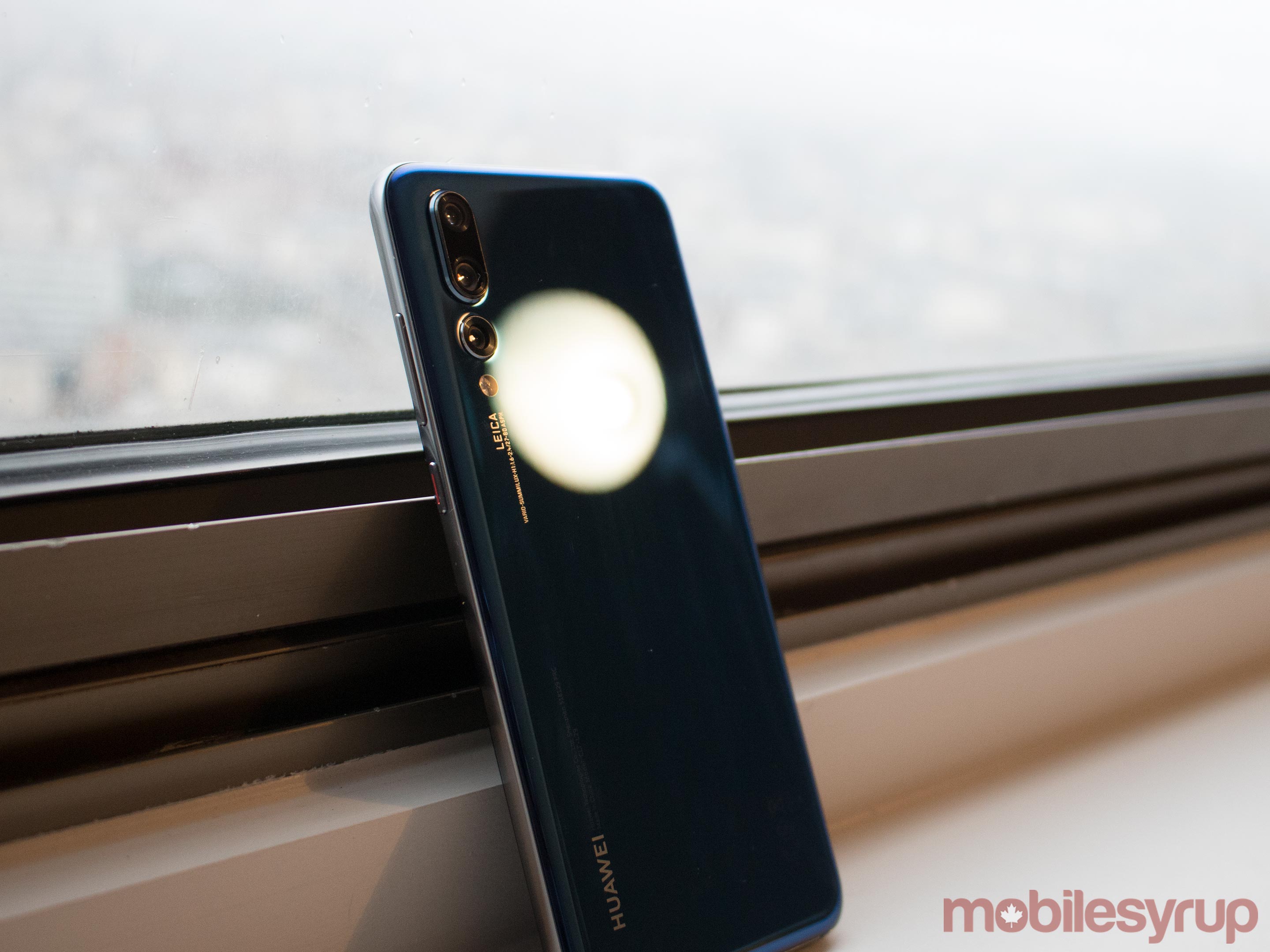 Huawei P20 Pro with light shining on rear