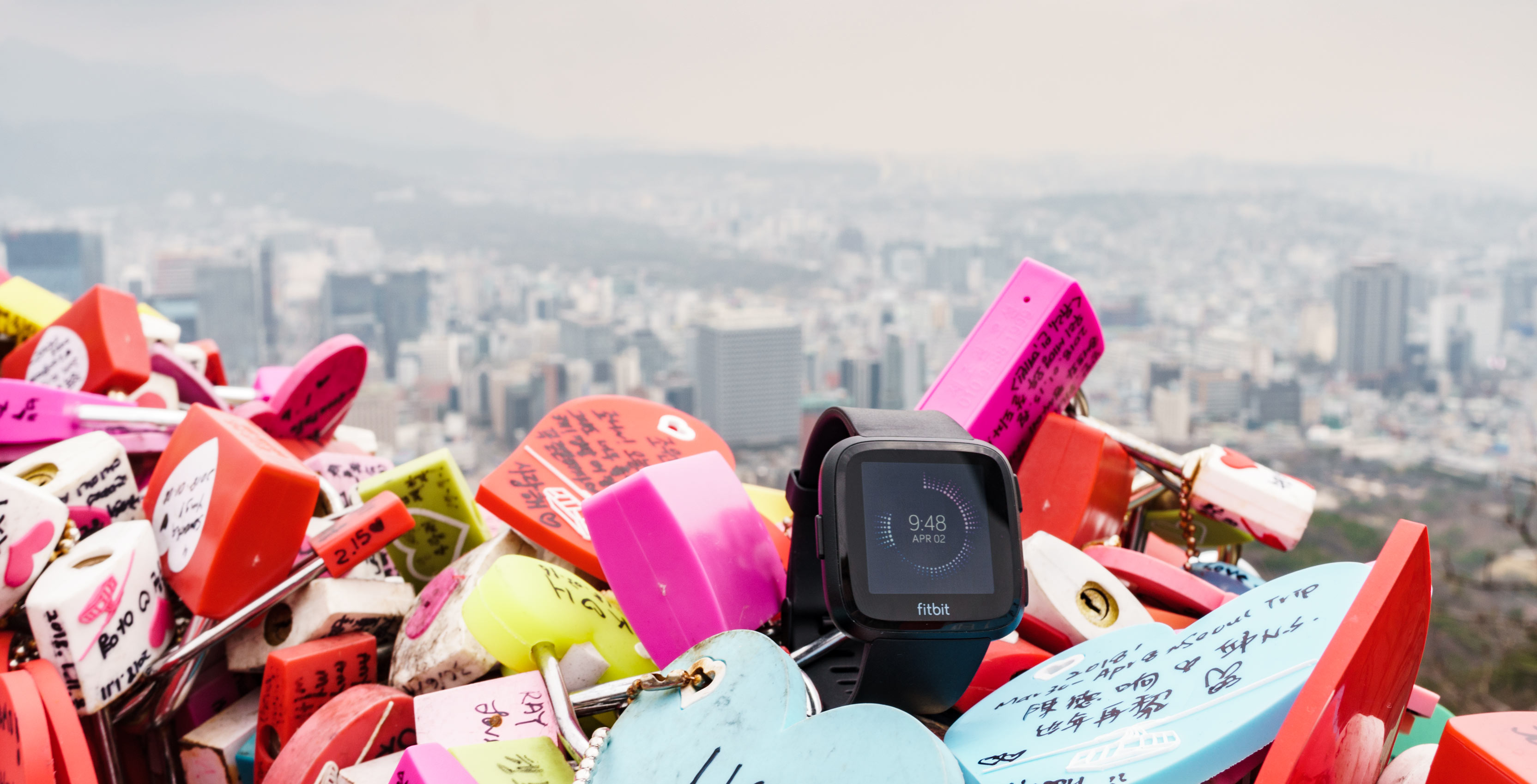 Fitbit Versa with city backdrop