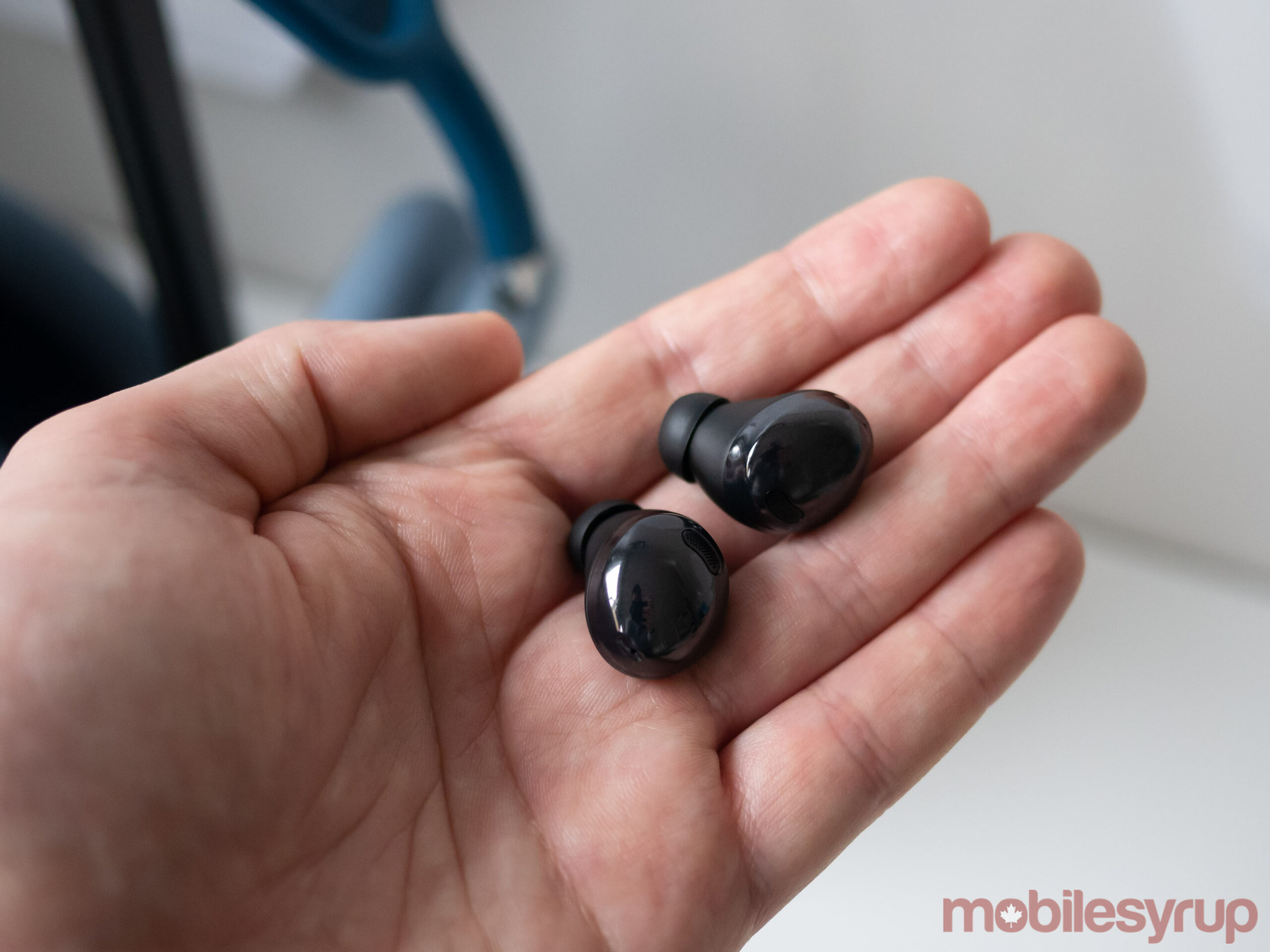 Galaxy Buds Pro being held in a hand 