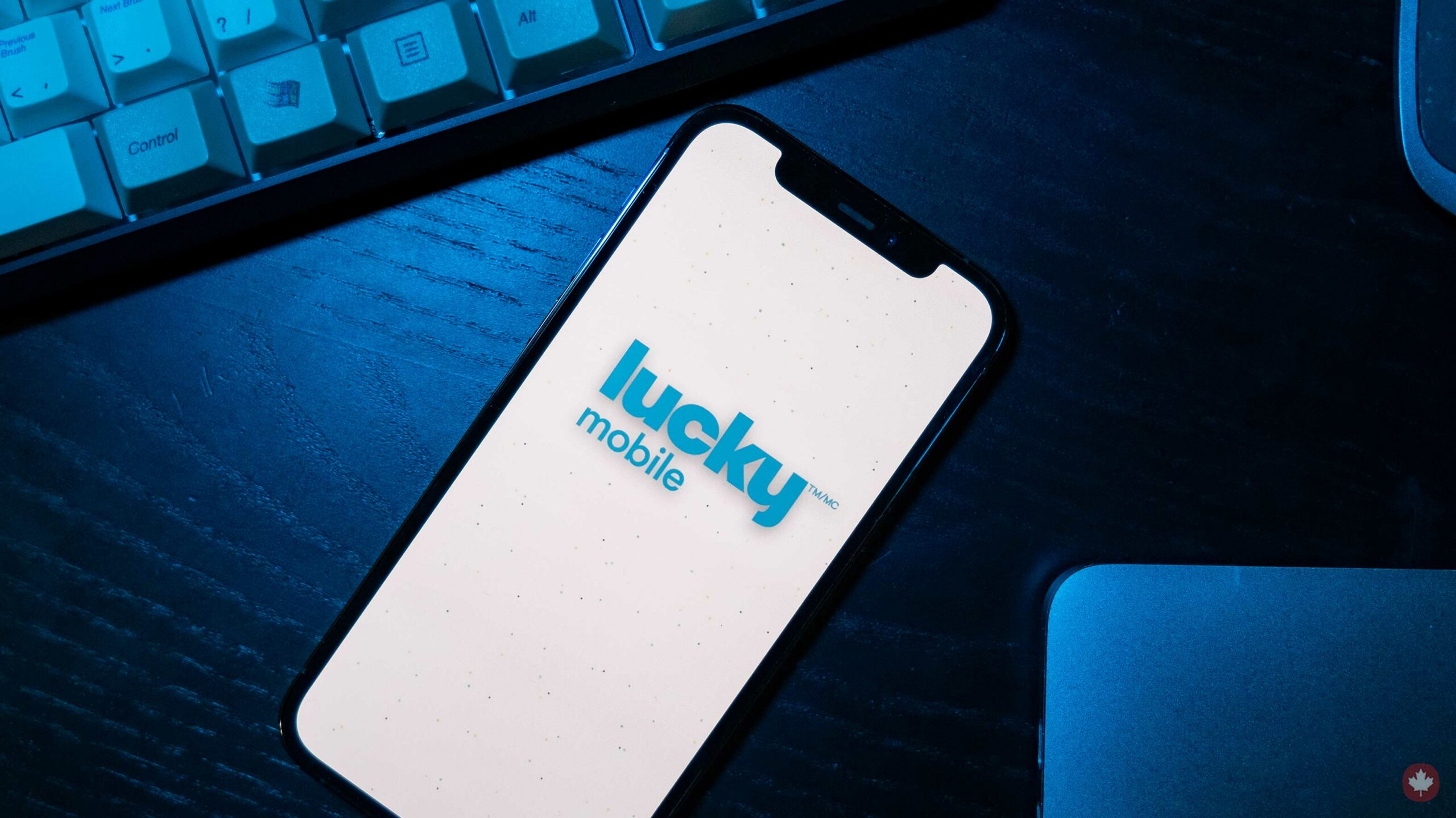 Lucky Mobile logo on a phone