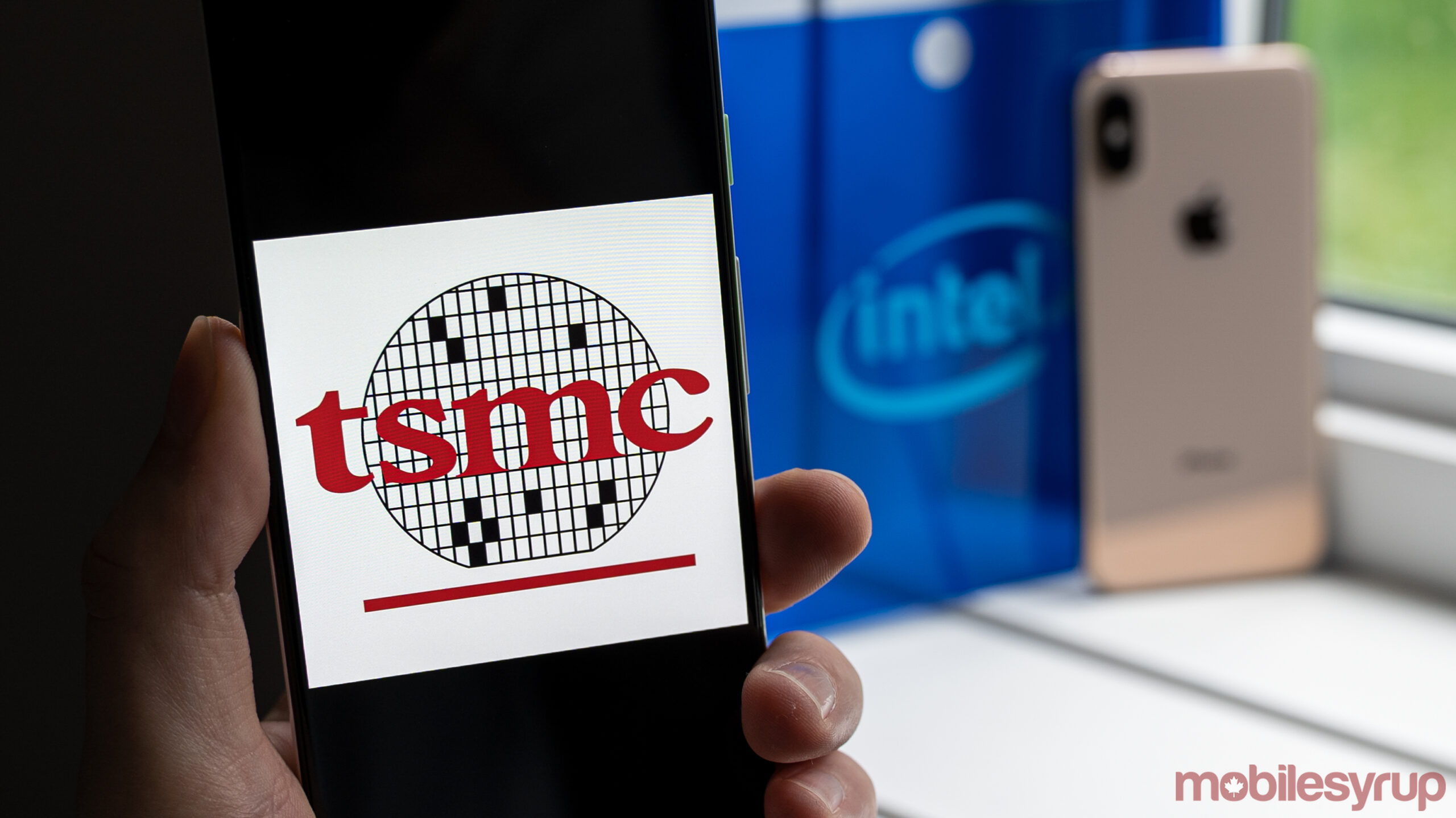 TSMC logo with Intel, Apple in the background
