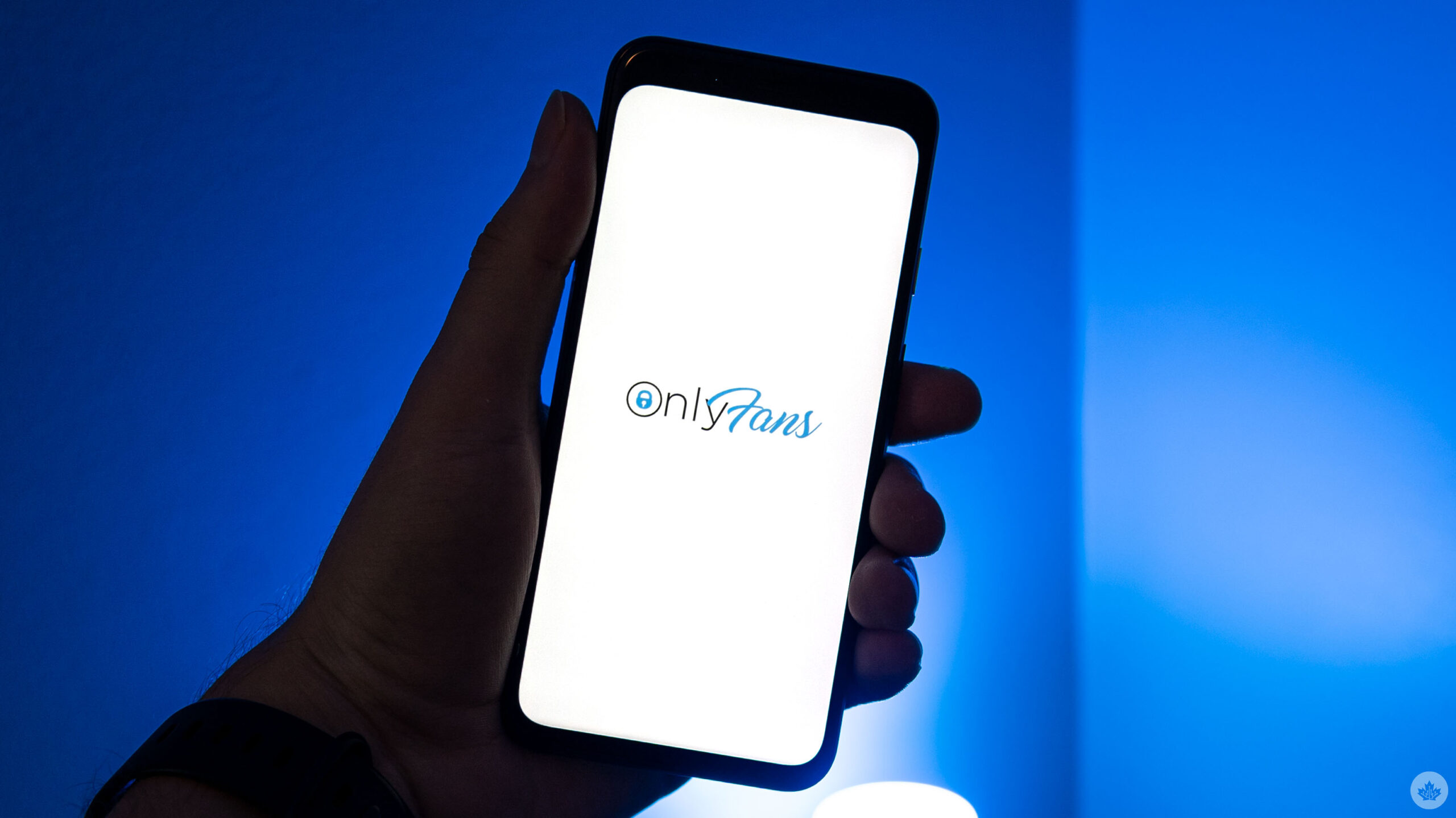 OnlyFans logo on a smartphone
