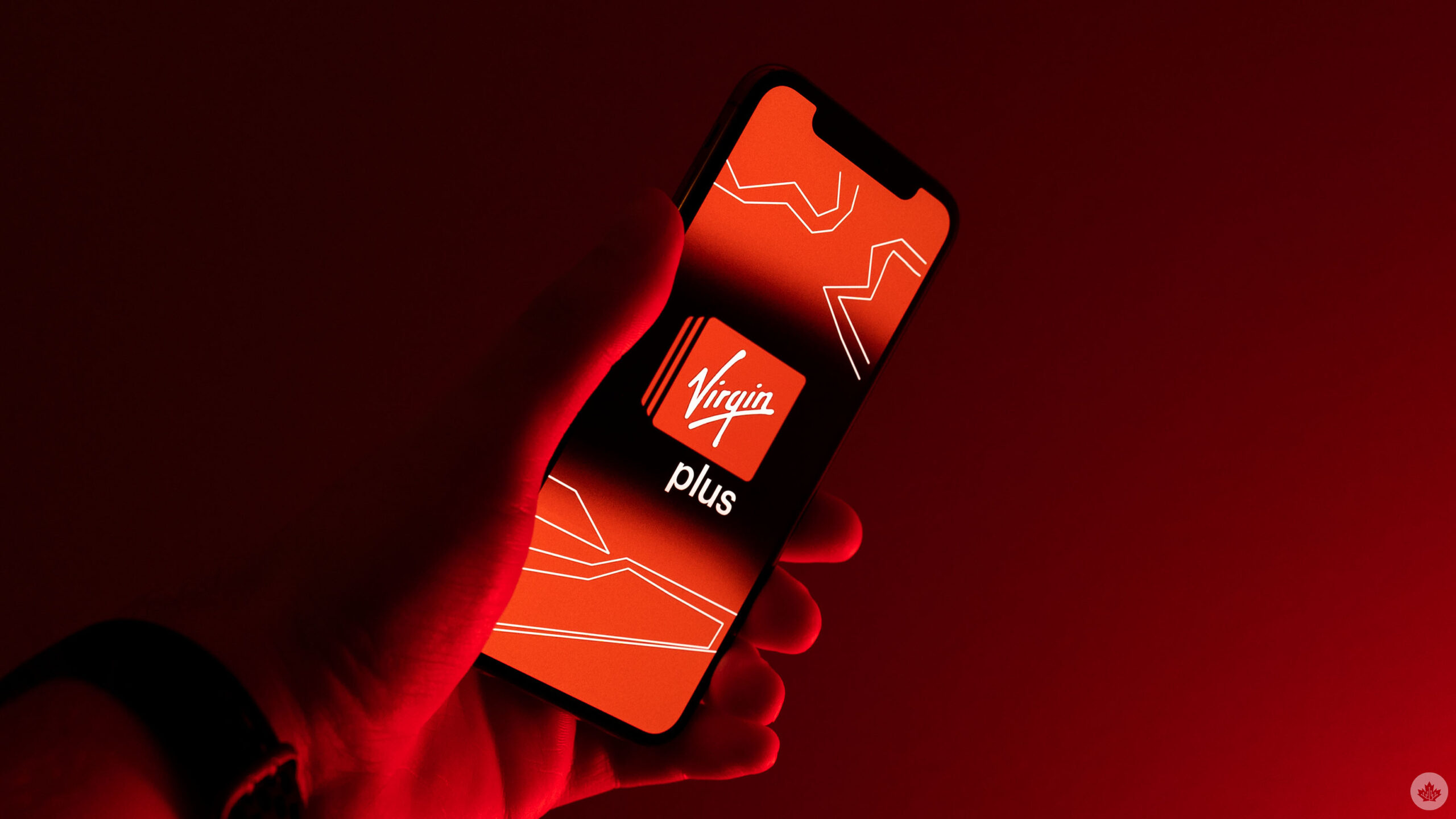 Virgin Plus logo on an iPhone