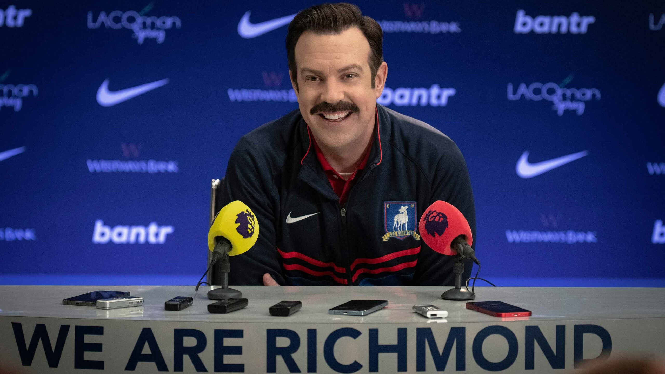 Ted gives a press conference in Ted Lasso Season 3