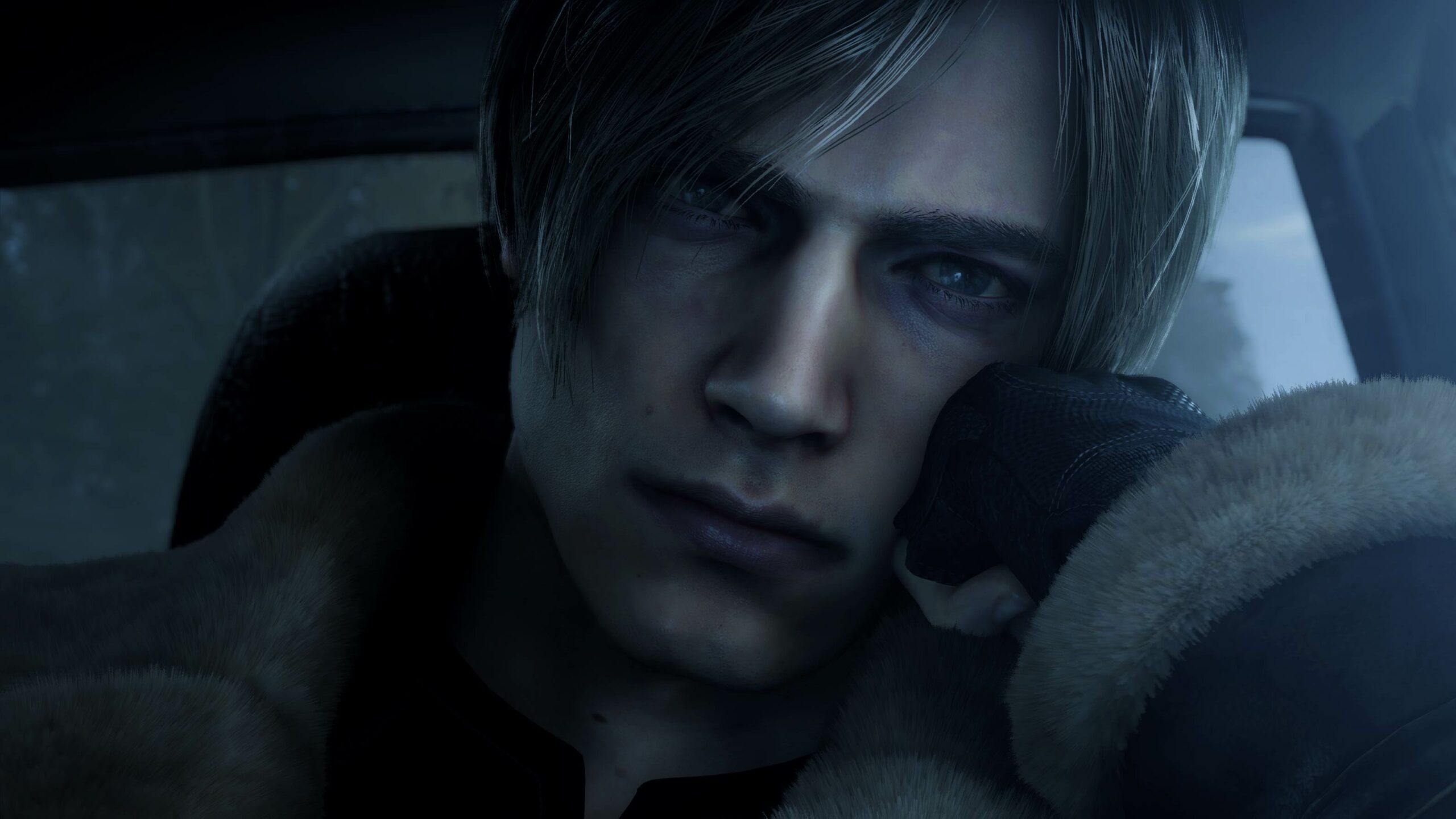 Resident Evil 4 Leon leaning on hand in car