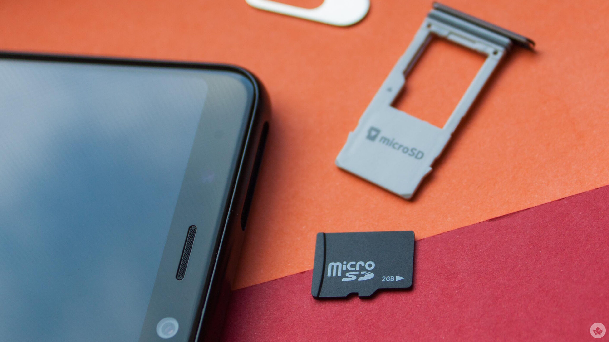 microSD card next to a smartphone